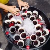 A Tub Full Of Soda Sits On Ice At The World Championships In Kona Hawaii 2022